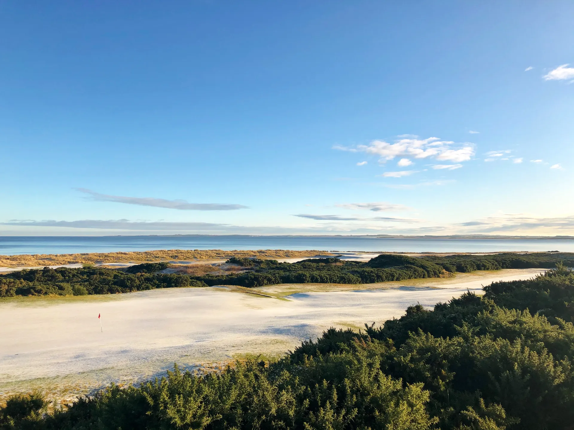 The 4th hole par 3 at Royal County Down with the Mountains of Mourne rising dramatically in the background
