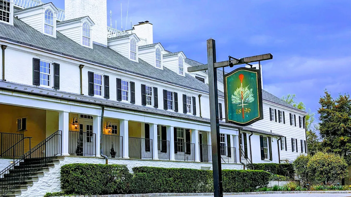 Merion Golf Club East Course's iconic wicker basket flagsticks against manicured fairways