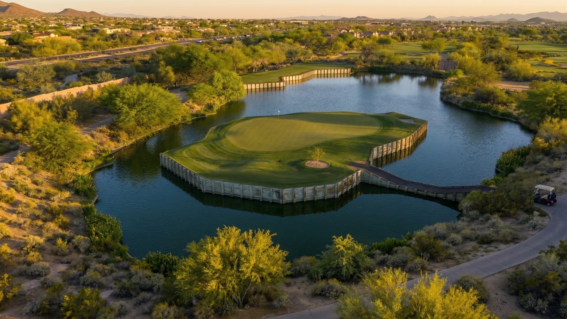 Grayhawk Talon's back nine winding through a deep Sonoran Desert box canyon with saguaro cacti framing the fairway and the McDowell Mountains beyond, Scottsdale, Arizona