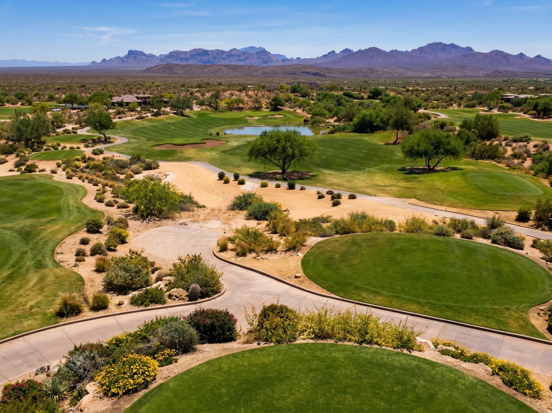 Desert fairway winding through saguaro cacti and brittle bush with the Superstition Mountains rising in the distance, We-Ko-Pa Golf Club Cholla Course, Fort McDowell, Arizona