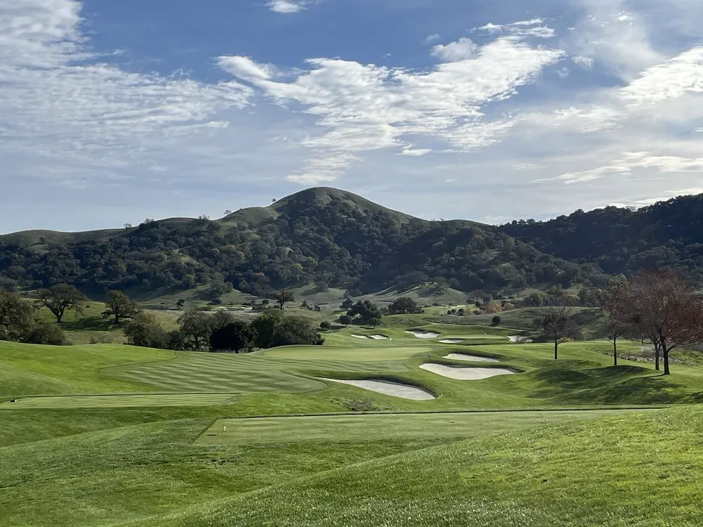 CordeValle Golf Club's oak-studded fairways and white-sand bunkers set against the golden foothills of the Santa Cruz Mountains in San Martin, California