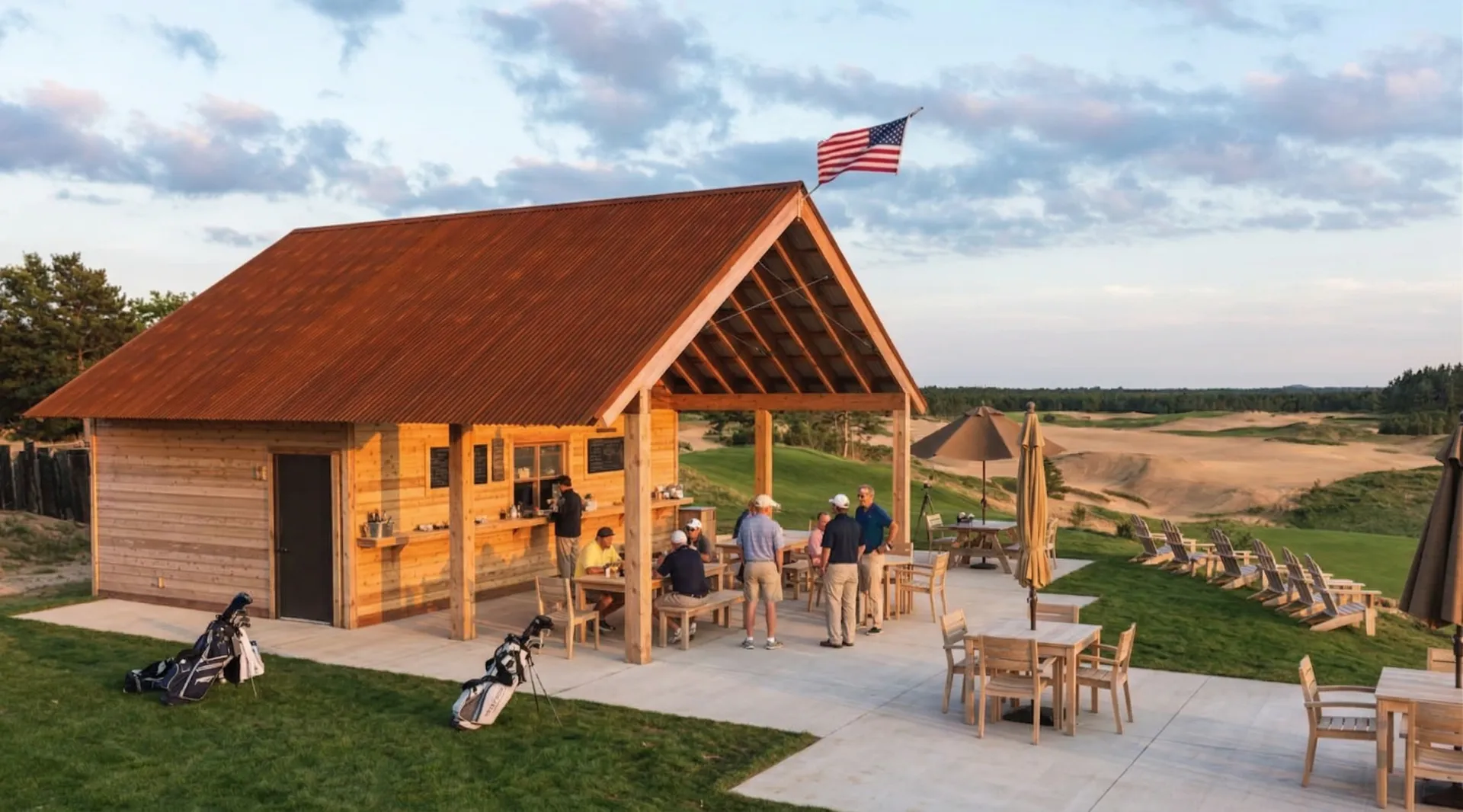 Rolling sand dunes and fescue fairways at Sand Valley Resort in central Wisconsin, with red pine forests framing the landscape